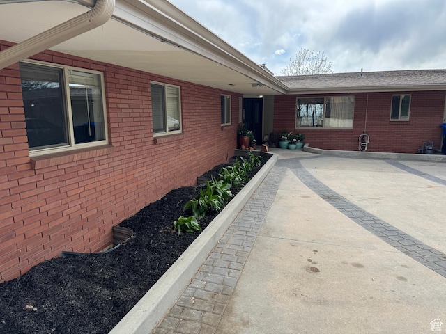 397 W 4125 N, Pleasant View, UT 84414 - view of home's exterior featuring brick siding