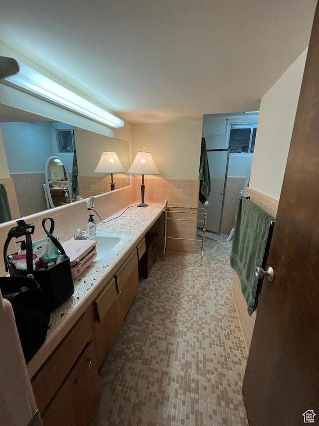 397 W 4125 N, Pleasant View, UT 84414 - bathroom featuring tile walls, wainscoting, and vanity