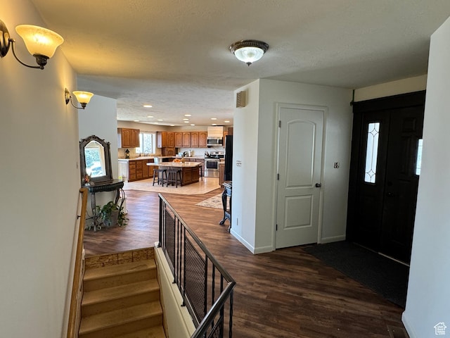 397 W 4125 N, Pleasant View, UT 84414 - foyer with dark wood-type flooring, recessed lighting, baseboards, and stairway