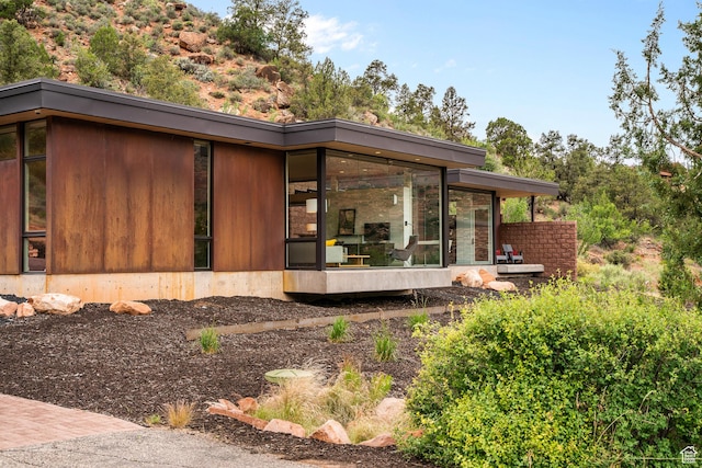 112 Canyon Cv, Springdale, UT 84767 - view of side of property with a sunroom