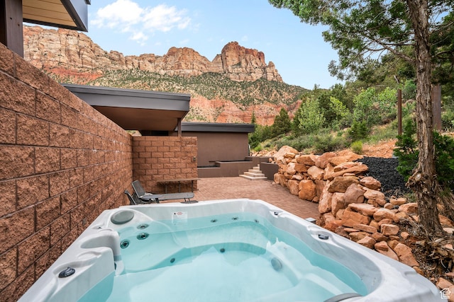 112 Canyon Cv, Springdale, UT 84767 - view of pool with a mountain view, an outdoor hot tub, and a patio area