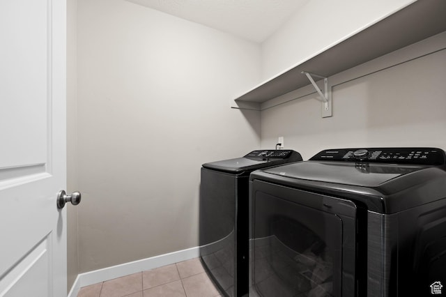 15084 S Wild Horse Way, Bluffdale, UT 84065 - laundry room with light tile patterned floors, independent washer and dryer, laundry area, and baseboards