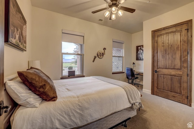 595 W 2050 S, Hurricane, UT 84737 - carpeted bedroom with ceiling fan and baseboards