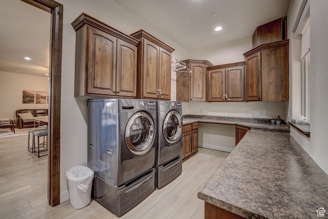 595 W 2050 S, Hurricane, UT 84737 - washroom featuring recessed lighting, light wood-style flooring, cabinet space, washing machine and clothes dryer, and baseboards