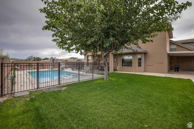 595 W 2050 S, Hurricane, UT 84737 - pool featuring a patio, a yard, and fence