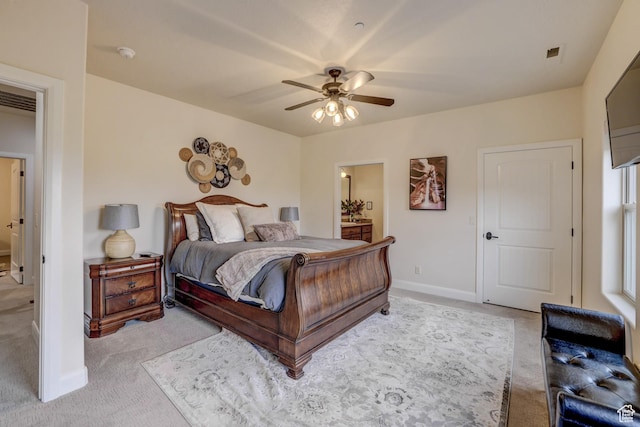 595 W 2050 S, Hurricane, UT 84737 - bedroom featuring connected bathroom, visible vents, baseboards, light carpet, and a ceiling fan