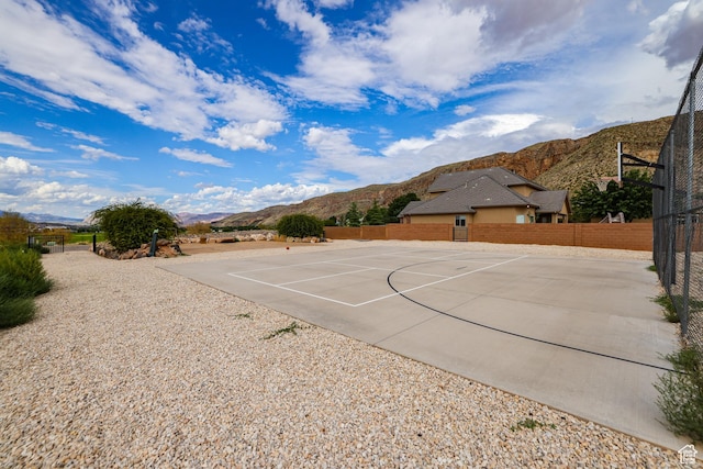595 W 2050 S, Hurricane, UT 84737 - view of basketball court with fence, a mountain view, and community basketball court