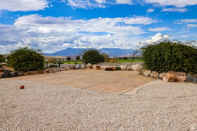 595 W 2050 S, Hurricane, UT 84737 - exterior space with a mountain view and a patio area