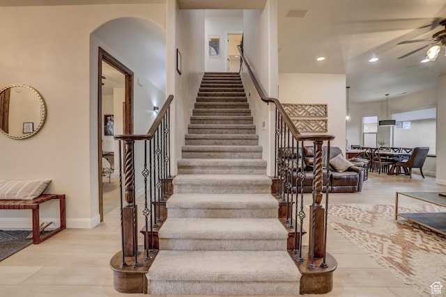 595 W 2050 S, Hurricane, UT 84737 - stairway with recessed lighting, a ceiling fan, baseboards, arched walkways, and wood finished floors