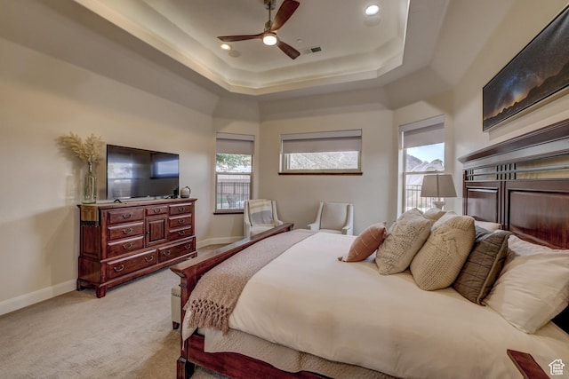 595 W 2050 S, Hurricane, UT 84737 - bedroom featuring recessed lighting, ceiling fan, a tray ceiling, light carpet, and baseboards