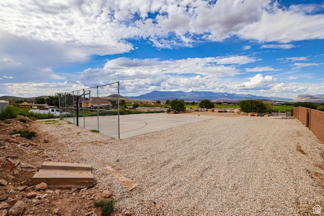 595 W 2050 S, Hurricane, UT 84737 - view of basketball court featuring fence, a mountain view, and community basketball court