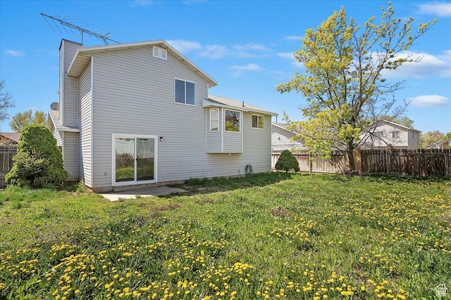 42 W 1980 S, Clearfield, UT 84015 - back of house featuring fence, a chimney, and a yard