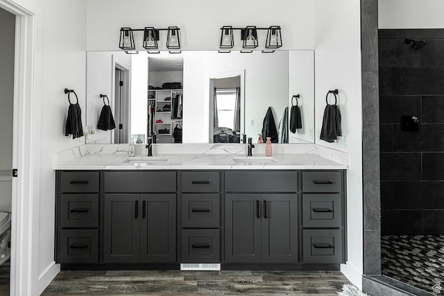 166 W 580 N, Redmond, UT 84652 - bathroom with a sink, double vanity, and tiled shower