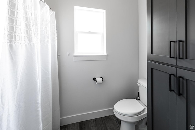 166 W 580 N, Redmond, UT 84652 - full bathroom with toilet, baseboards, and wood finished floors