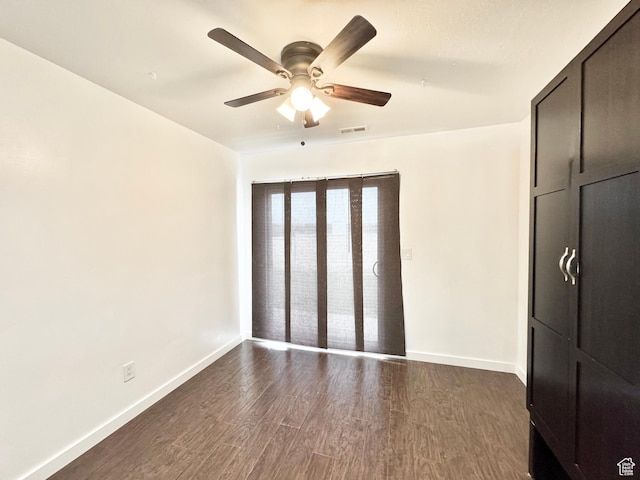 1614 W Eisenhower Way, Salt Lake City, UT 84104 - unfurnished bedroom featuring visible vents, a ceiling fan, dark wood finished floors, and baseboards