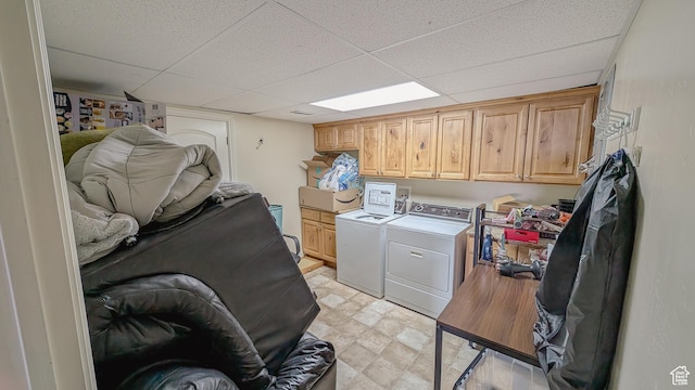 laundry area featuring cabinet space and separate washer and dryer