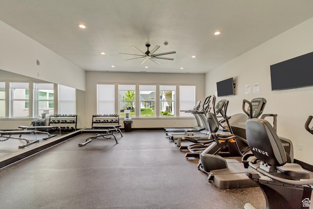 workout area with recessed lighting and baseboards
