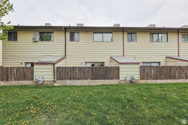 rear view of property featuring cooling unit