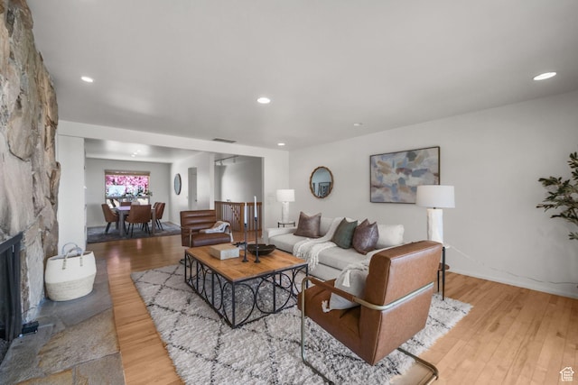 813 N Northview Dr E, Salt Lake City, UT 84103 - living room with recessed lighting, visible vents, wood finished floors, and a fireplace