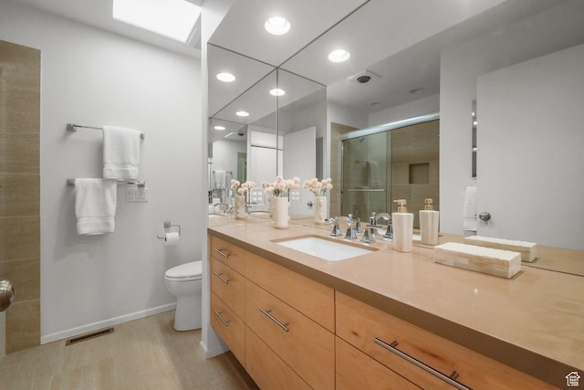 813 N Northview Dr E, Salt Lake City, UT 84103 - bathroom with recessed lighting, a shower stall, toilet, vanity, and visible vents