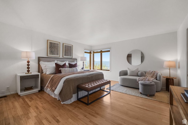 813 N Northview Dr E, Salt Lake City, UT 84103 - bedroom featuring light wood-style floors, visible vents, and baseboards