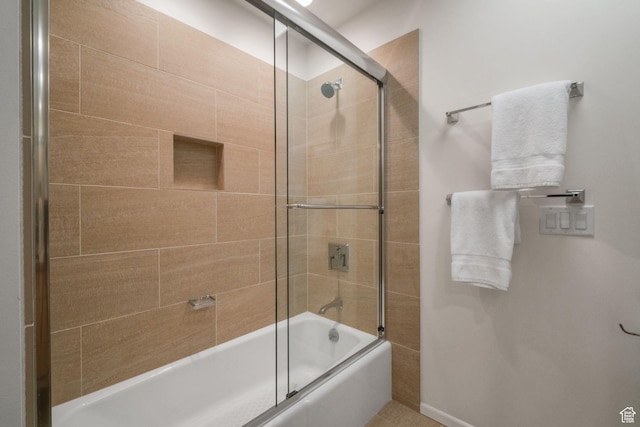 813 N Northview Dr E, Salt Lake City, UT 84103 - bathroom featuring shower / bath combination with glass door