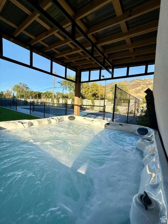 13327 S Bullitt Ln, Draper, UT 84020 - view of pool featuring fence and a hot tub