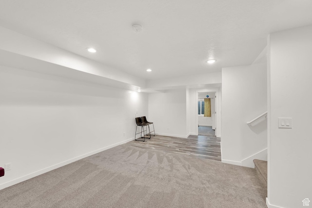 1131 S Red Cliff Dr, Santaquin, UT 84655 - finished below grade area with stairway, baseboards, carpet flooring, and recessed lighting
