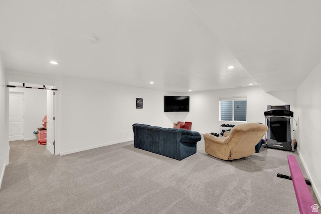 1131 S Red Cliff Dr, Santaquin, UT 84655 - carpeted living area featuring recessed lighting, baseboards, and a barn door