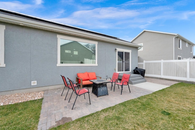 1131 S Red Cliff Dr, Santaquin, UT 84655 - rear view of property featuring fence, stucco siding, a yard, and a patio area