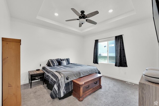 1131 S Red Cliff Dr, Santaquin, UT 84655 - carpeted bedroom with recessed lighting, a tray ceiling, and baseboards
