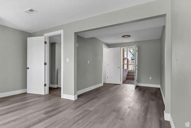 3502 W 8350 S, West Jordan, UT 84088 - spare room featuring baseboards, visible vents, and wood finished floors
