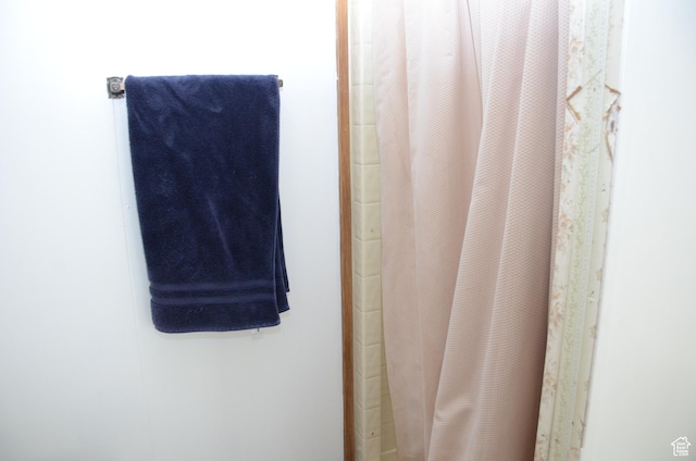 645 N 600 E, Hyrum, UT 84319 - full bathroom featuring a shower with shower curtain