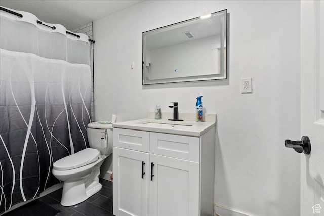3902 W 4955 S, Taylorsville, UT 84129 - full bathroom featuring visible vents, toilet, curtained shower, and vanity