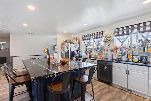 3902 W 4955 S, Taylorsville, UT 84129 - bar with recessed lighting, light wood-type flooring, dishwasher, and a sink