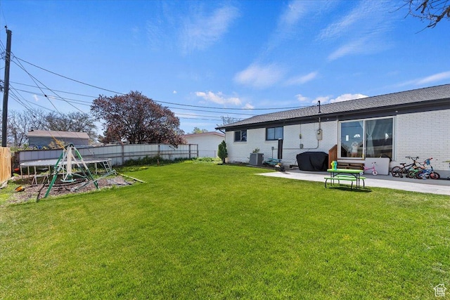 3902 W 4955 S, Taylorsville, UT 84129 - view of yard with a patio, a fenced backyard, and central air condition unit