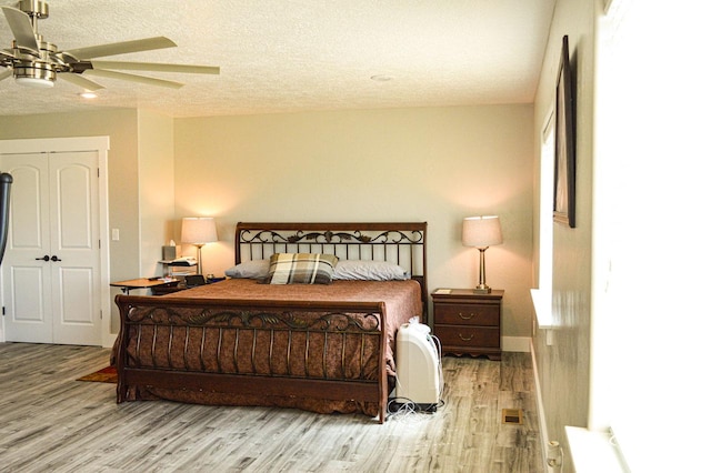 5859 E Ashley Creek Rd S, Vernal, UT 84078 - bedroom with wood finished floors, a textured ceiling, and ceiling fan