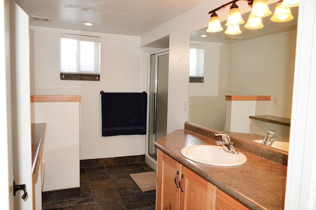 5859 E Ashley Creek Rd S, Vernal, UT 84078 - bathroom featuring vanity, baseboards, a shower stall, a chandelier, and recessed lighting