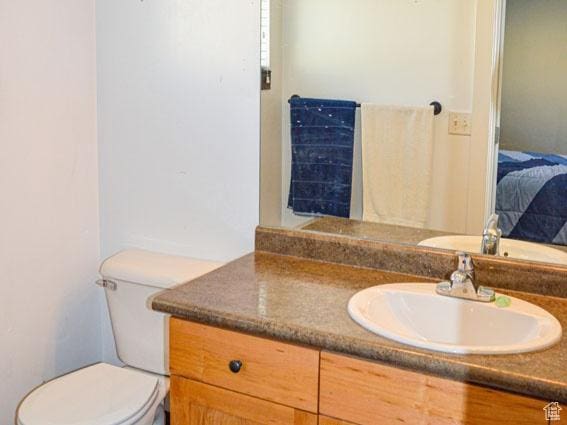5859 E Ashley Creek Rd S, Vernal, UT 84078 - ensuite bathroom with vanity and toilet