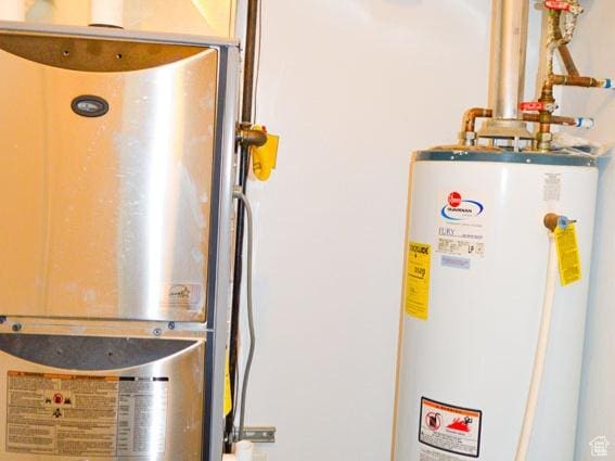 5859 E Ashley Creek Rd S, Vernal, UT 84078 - utility room with gas water heater and water heater