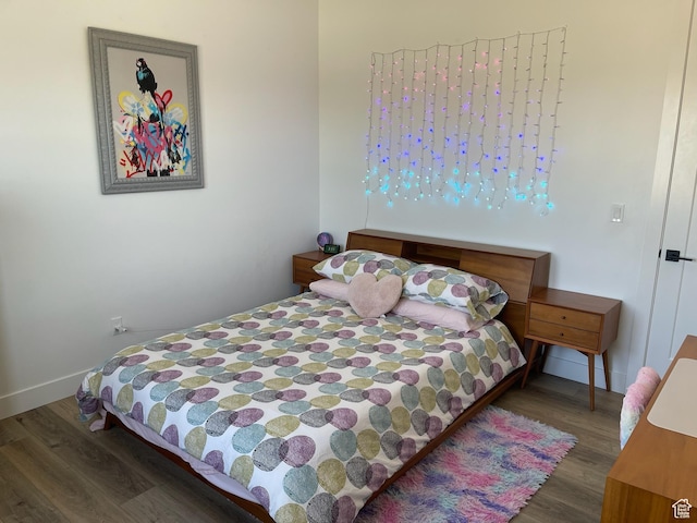 889 S Winter Ln, North Salt Lake, UT 84054 - bedroom featuring baseboards and wood finished floors