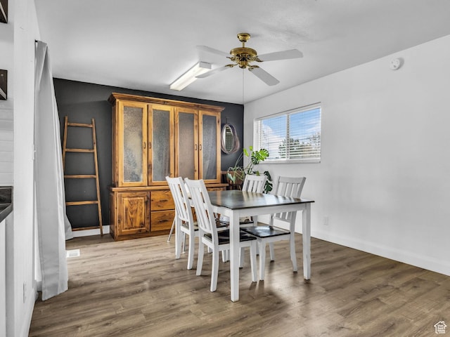 295 S 200 W, Delta, UT 84624 - dining area with a ceiling fan, baseboards, and wood finished floors