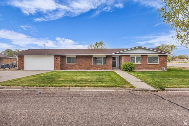 295 S 200 W, Delta, UT 84624 - single story home featuring concrete driveway, brick siding, an attached garage, and a front yard