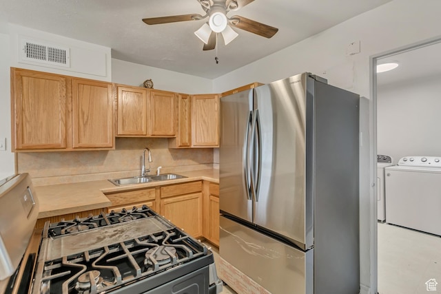 4826 S 4860 W, Salt Lake City, UT 84118 - kitchen featuring freestanding refrigerator, light brown cabinetry, a sink, and washing machine and clothes dryer