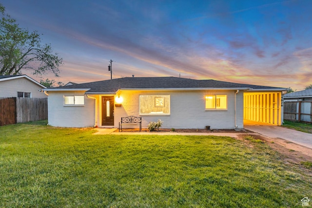 4826 S 4860 W, Salt Lake City, UT 84118 - ranch-style home featuring fence, a shingled roof, a yard, and driveway