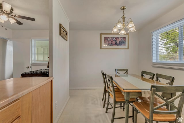 4826 S 4860 W, Salt Lake City, UT 84118 - dining room with baseboards and ceiling fan with notable chandelier