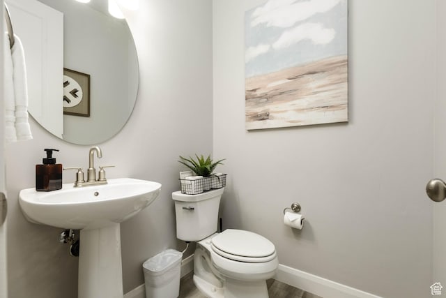 1427 N Rustico Dr, Washington, UT 84780 - bathroom with toilet, baseboards, and wood finished floors