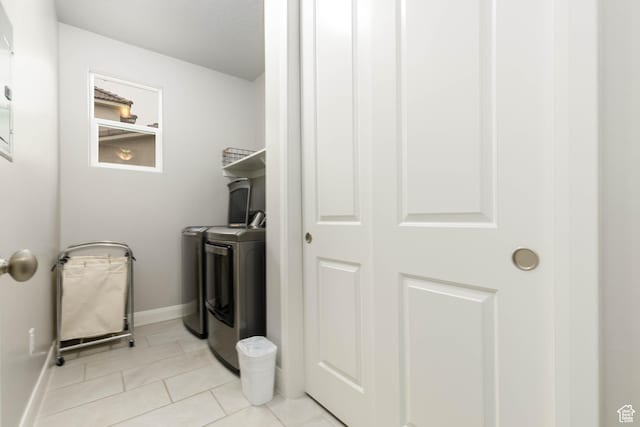 1427 N Rustico Dr, Washington, UT 84780 - clothes washing area featuring independent washer and dryer, baseboards, and light tile patterned floors