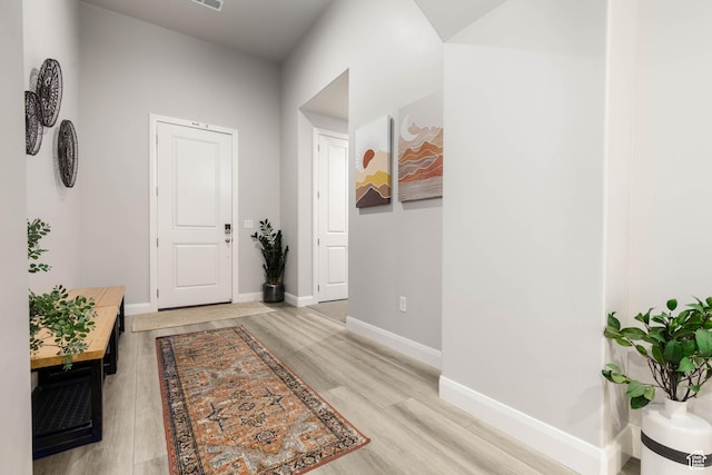 1427 N Rustico Dr, Washington, UT 84780 - hall featuring light wood-style floors and baseboards