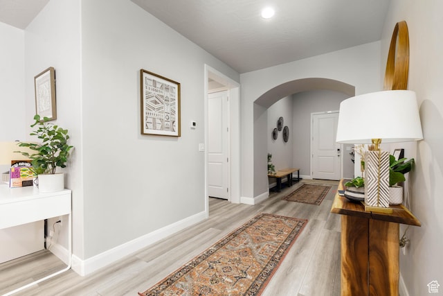 1427 N Rustico Dr, Washington, UT 84780 - hall featuring arched walkways, light wood-style floors, baseboards, and recessed lighting